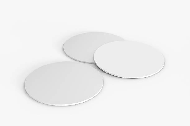istock Round drink or beer coaster mockup set, isolated on background. Protection bierdeckel for beer glasses, bottle, can, cup holder. Empty bottle coaster lying template for beverage branding. 3d render 2215045437