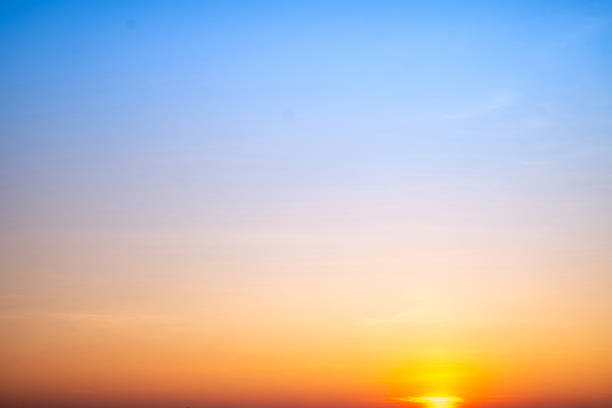 Beautiful , luxury soft gradient orange gold clouds and sunlight on the blue sky perfect for the background, take in evening,Twilight, Large size, high definition landscape photo