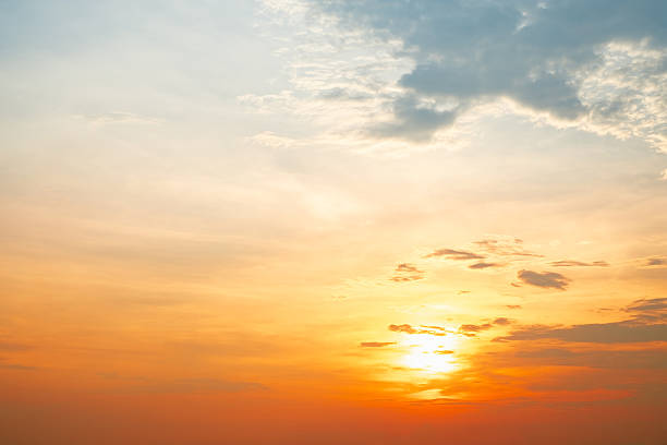 istock Beautiful , luxury soft gradient orange gold clouds and sunlight on the blue sky perfect for the background, take in evening,Twilight, Large size, high definition landscape photo 2215050665