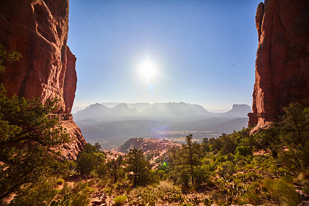 Sedona's stone mountains, characterized by their vivid red sandstone formations and towering cliffs, create a striking contrast against the desert landscape. These natural monuments dominate the horizon with steep ridges and dramatic buttes, providing a rugged yet beautiful environment for exploration.