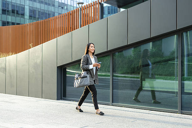 istock Asian businesswoman after work 2215054032