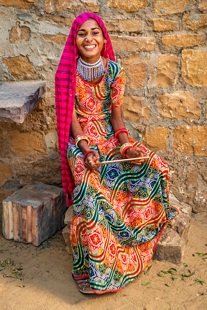 istock Happy Indian girl using a digital tablet, India 2215059411
