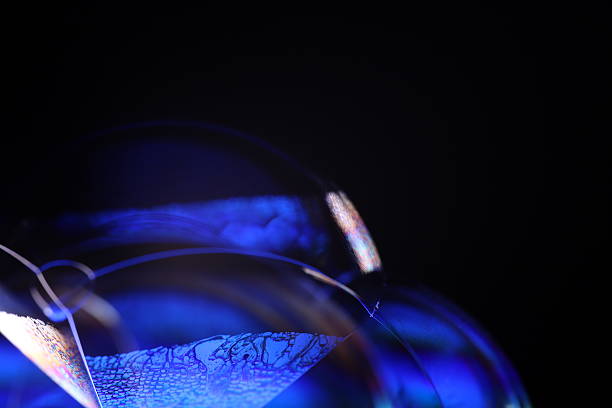 istock Deep purple liquid surface on black background, oil stains movement, bright chemistry, surreal background, deep galaxy atmosphere 2215061511