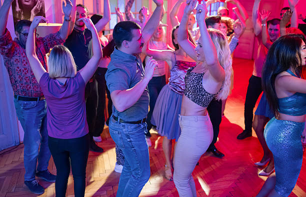 istock Diverse Group Dancing Together in Party Dance Studio Party 2215065098