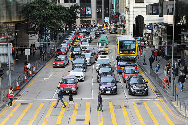 istock Hong Kong downtown business district busy crowded crosswalk 2215068169