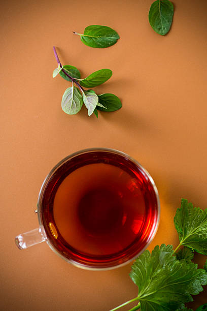 istock Herbal drink with mint and currant in transparent cup 2215069997