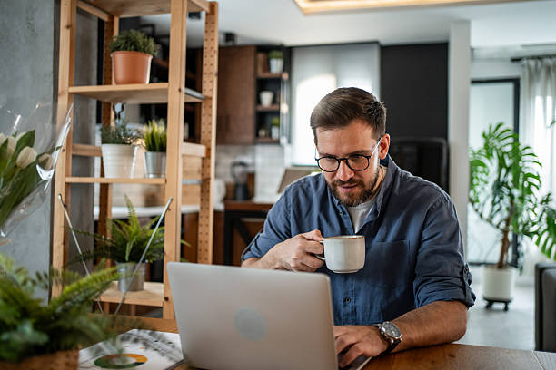 istock Focused freelancer working from home, enjoying a coffee break 2215070686