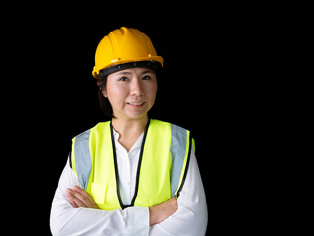 istock factory woman workers or technicians civil Engineer or Architecture project management smile at camera. 2215071701