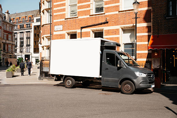 istock Delivery van in a city 2215072226