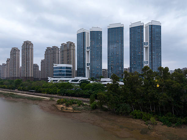 istock High rise buildings by the river in modern cities 2215072357