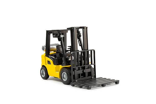 istock Yellow trucks and cardboard boxes isolated on white background. Concept logistics, delivery and transport topics. Delivery of goods or products to the store around the world. Cardboard box. 2215080306