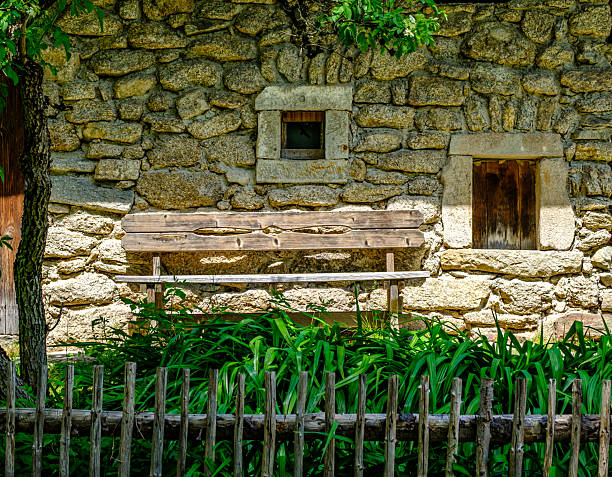 old wooden bench at a farmhouse - photo