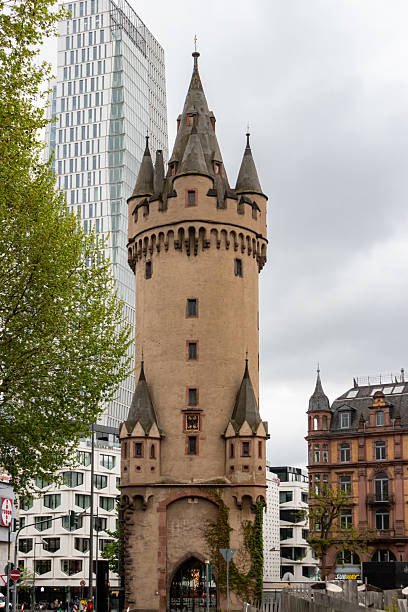 Frankfurt, Germany April 18, 2025: The Eschenheimer Turm (Eschenheim Tower), a striking medieval tower built to be a city gate of the late-medieval fortifications of Frankfurt am Main