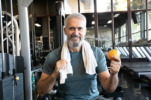 istock Healthy Senior Man Training in Modern Gym – Active Lifestyle Over 50 2215100933