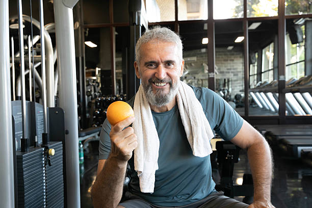 istock Healthy Senior Man Training in Modern Gym – Active Lifestyle Over 50 2215100937
