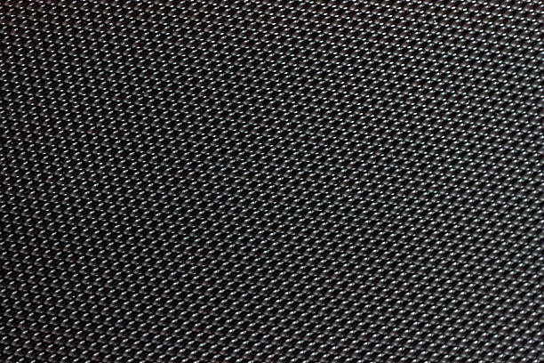 istock Abstract Geometric grid background, carbon mesh texture. Modern dark macro texture. Close-up object concept 2215111248