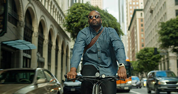 istock Bicycle Commuter Biking to Work in Downtown Los Angeles 2215113921
