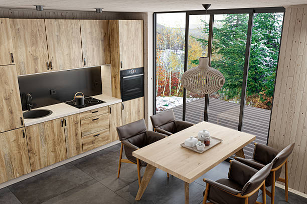 istock Modern Scandinavian Kitchen with Oak Cabinets and Floor-to-Ceiling Window 2215116992