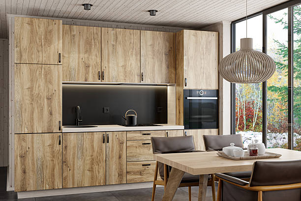 istock Modern Scandinavian Kitchen with Oak Cabinets and Floor-to-Ceiling Window 2215117009