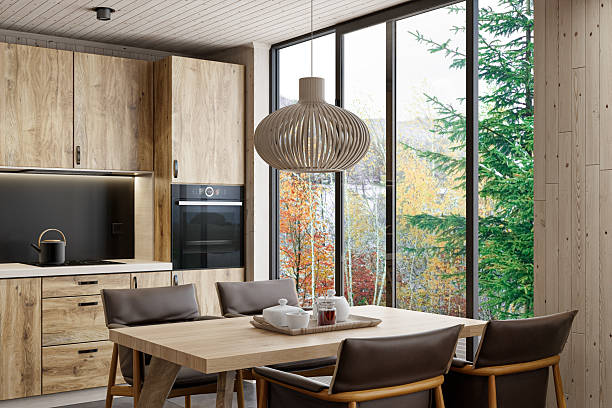 istock Modern Scandinavian Kitchen with Oak Cabinets and Floor-to-Ceiling Window 2215117013