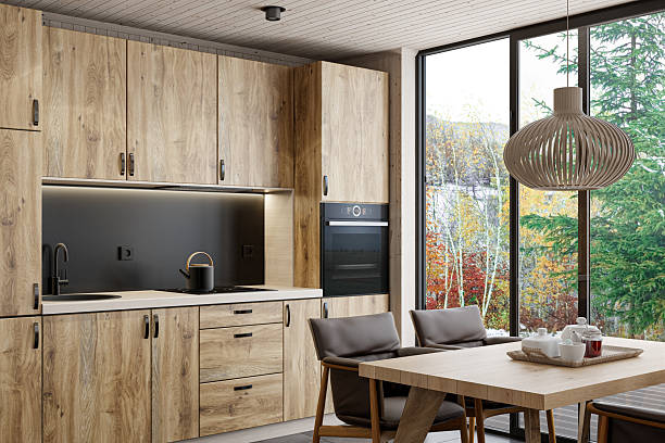 istock Modern Scandinavian Kitchen with Oak Cabinets and Floor-to-Ceiling Window 2215117015