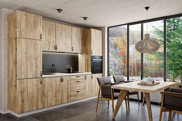istock Modern Scandinavian Kitchen with Oak Cabinets and Floor-to-Ceiling Window 2215117019