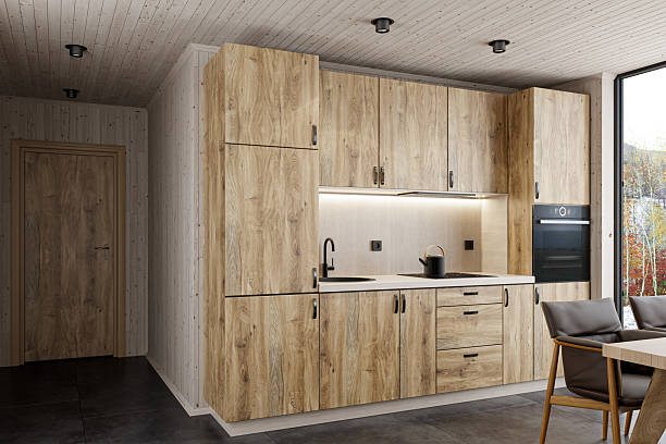 istock Modern Scandinavian Kitchen with Oak Cabinets and Floor-to-Ceiling Window 2215117038