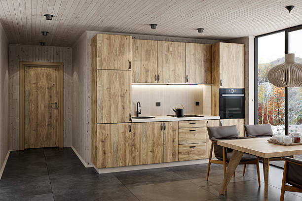 istock Modern Scandinavian Kitchen with Oak Cabinets and Floor-to-Ceiling Window 2215117059