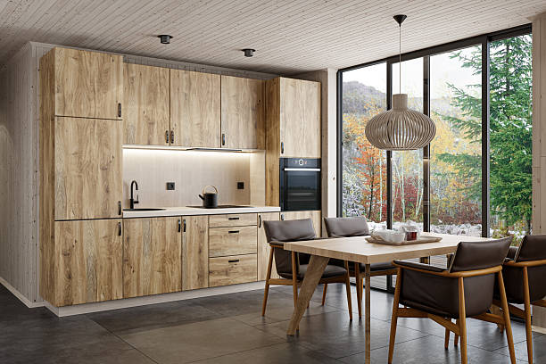 istock Modern Scandinavian Kitchen with Oak Cabinets and Floor-to-Ceiling Window 2215117067