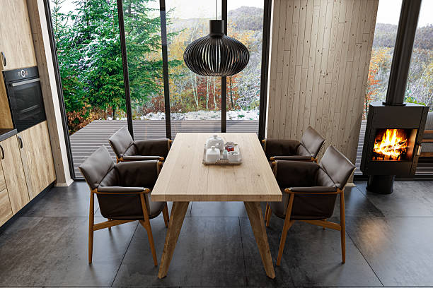 istock Scandinavian Kitchen Interior with Oak Cabinets and Freestanding Modern Fireplace 2215117274