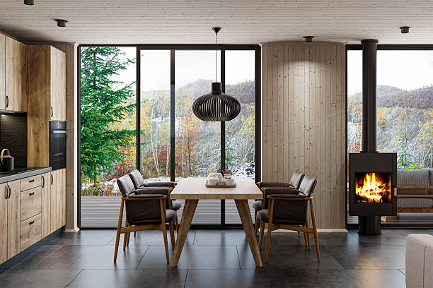 istock Scandinavian Kitchen Interior with Oak Cabinets and Freestanding Modern Fireplace 2215117277