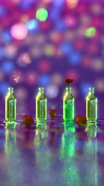 istock Five green bottles on reflective surface with scattered red roses and colorful bokeh lights in purple and pink gradient background 2215126370