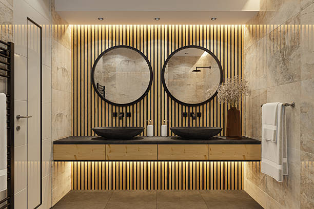 istock Modern Luxury Bathroom with Black Stone Sinks and Warm Ambient Lighting 2215129240