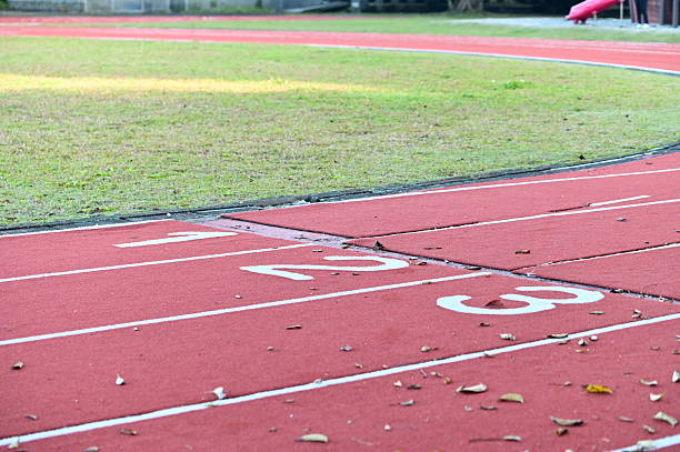 istock Starting Line of Athletic Track Marked with 1-2-3 2215137007