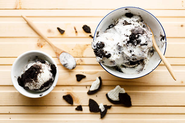 Cookies and cream ice cream in a white bowl.