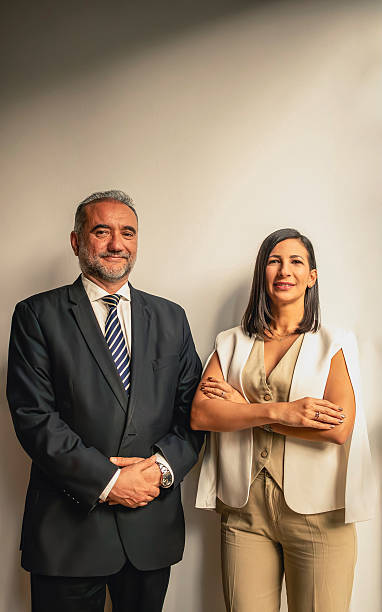 istock Two business people smiling with confidence and professionalism 2215144335