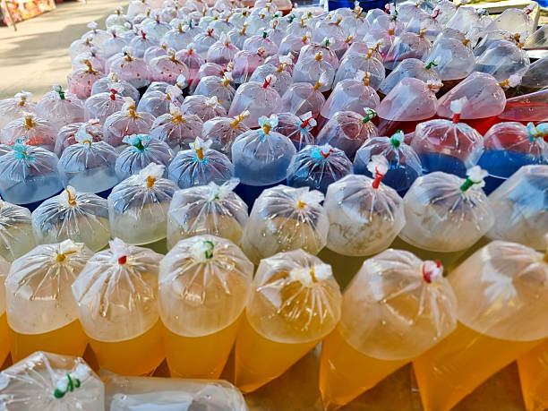 Colorful Thai Street Drinks in Plastic Bags Ready for Sale