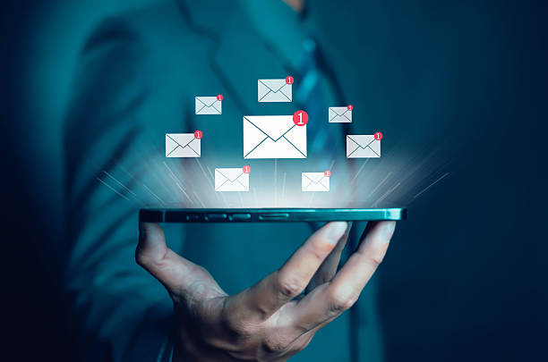 istock Businessman touching email on virtual screen. New email notification concept for business email communication. Internet technology. Mailbox receives electronic message notification. 2215153957