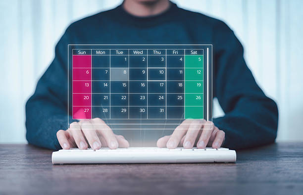 istock Business people use work schedules in business as a technological plan and project for proper planning and knowing the timeline of the work progress. 2215154172