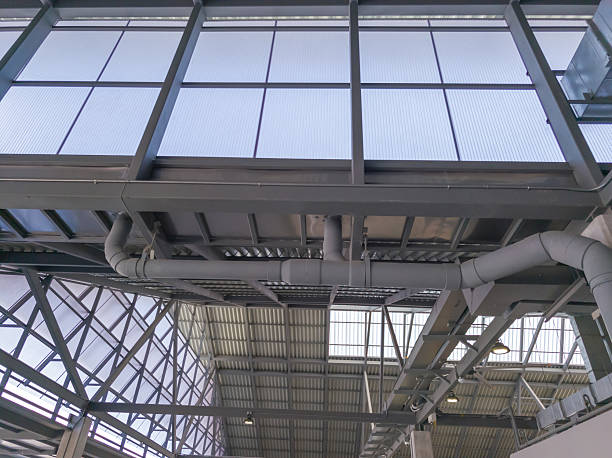 istock Low angle view of restaurant roof with gutters inside the building. 2215154180