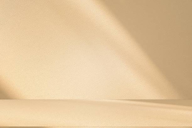 istock Studio style background wall decoration presentation uses white and beige tones. with shadows cast from a nearby window, concept creating a decorative 2215158309