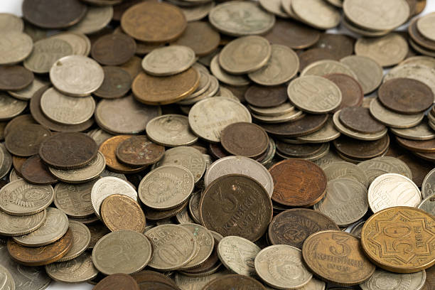 istock Coins different countries are scattered on table closeup. 2215167451
