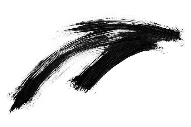 istock Black brush strokes in form an arrow stand out on white background. 2215167481