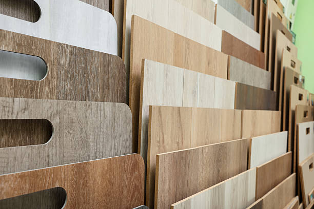 istock Many different samples of wooden flooring in store, closeup 2215170037