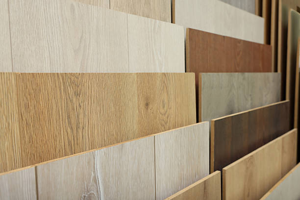 istock Many different samples of wooden flooring in store, closeup 2215170071