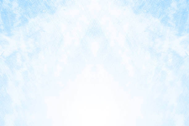 istock Light blue and white colored bright soft pastel faded symmetrical grunge textured horizontal vector backgrounds like chaotic dramatic cloudy beautiful sky or tranquil sunbeam from heaven 2215170222