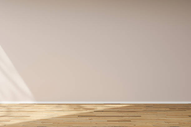 istock This empty room features a bare floor and plain walls, providing an ideal blank canvas for interior design. Natural light floods in, highlighting the potential for creative decor 2215177057