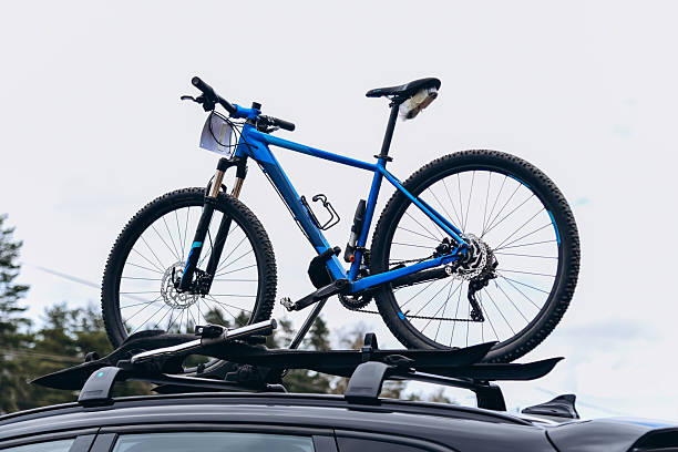 istock bicycle mounted on car roof 2215179486