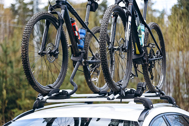 istock two bicycles mounted on car roof 2215179488