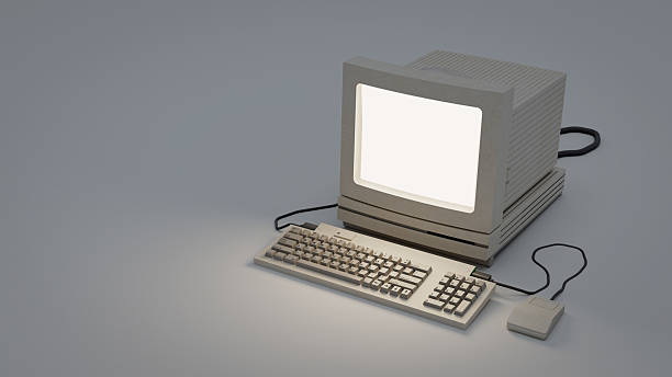 istock A vintage computer setup featuring a monitor, keyboard, and mouse, highlighting retro technology design. 3d rendering. 2215180948